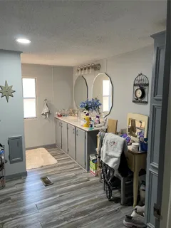 a bedroom with bed and a window