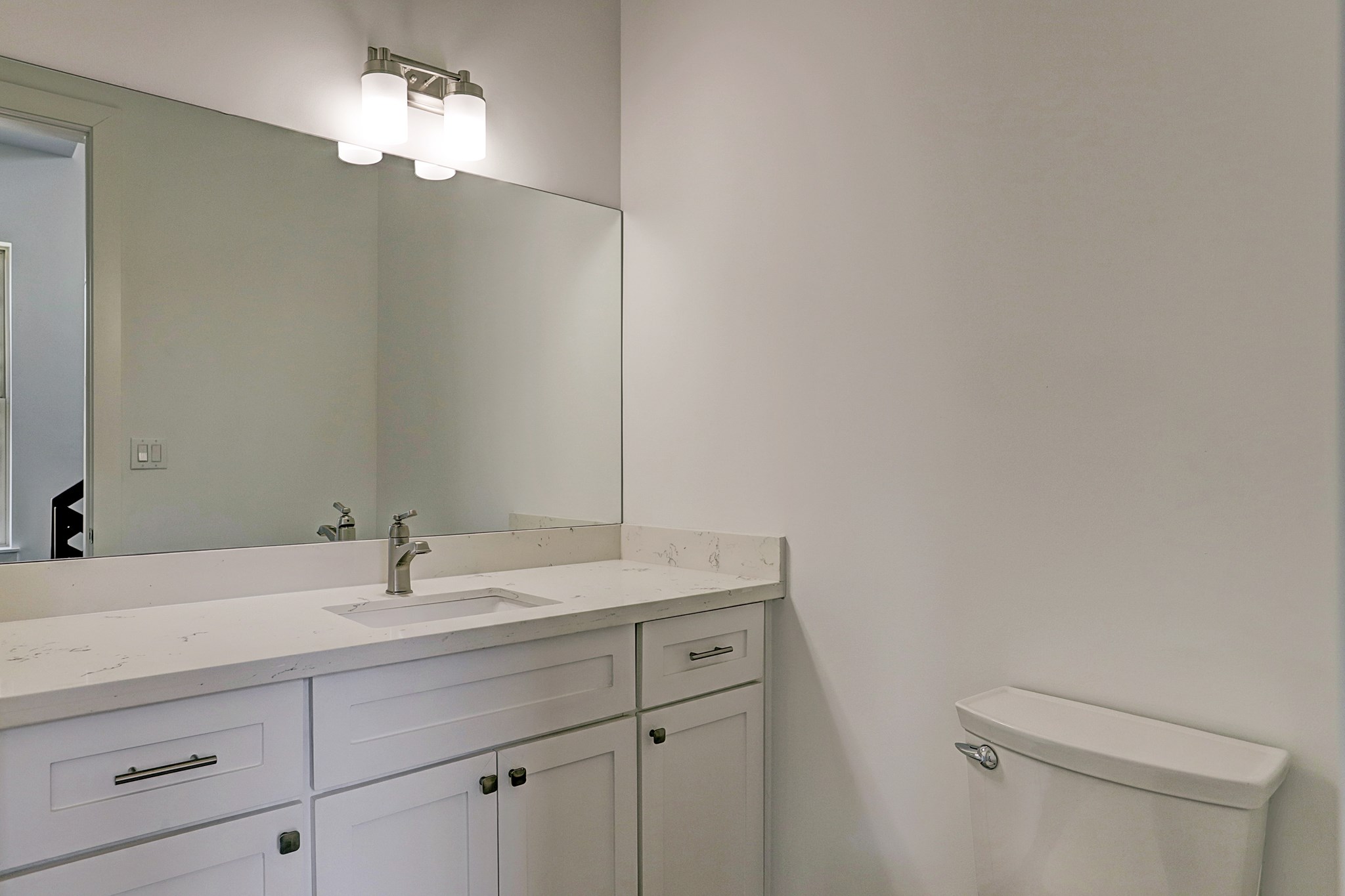 1402 Eberhard Street Houston, TX 77019 - Photo 14 of 50 a bathroom with a sink and a mirror