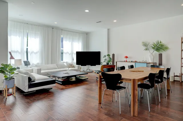 a view of a fireplace and a floor to ceiling window
