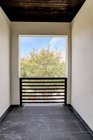a view of a fireplace and a floor to ceiling window