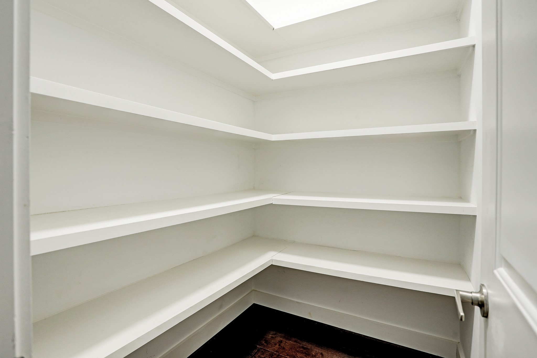 1402 Eberhard Street Houston, TX 77019 - Photo 30 of 50 a storage room with a wooden floor