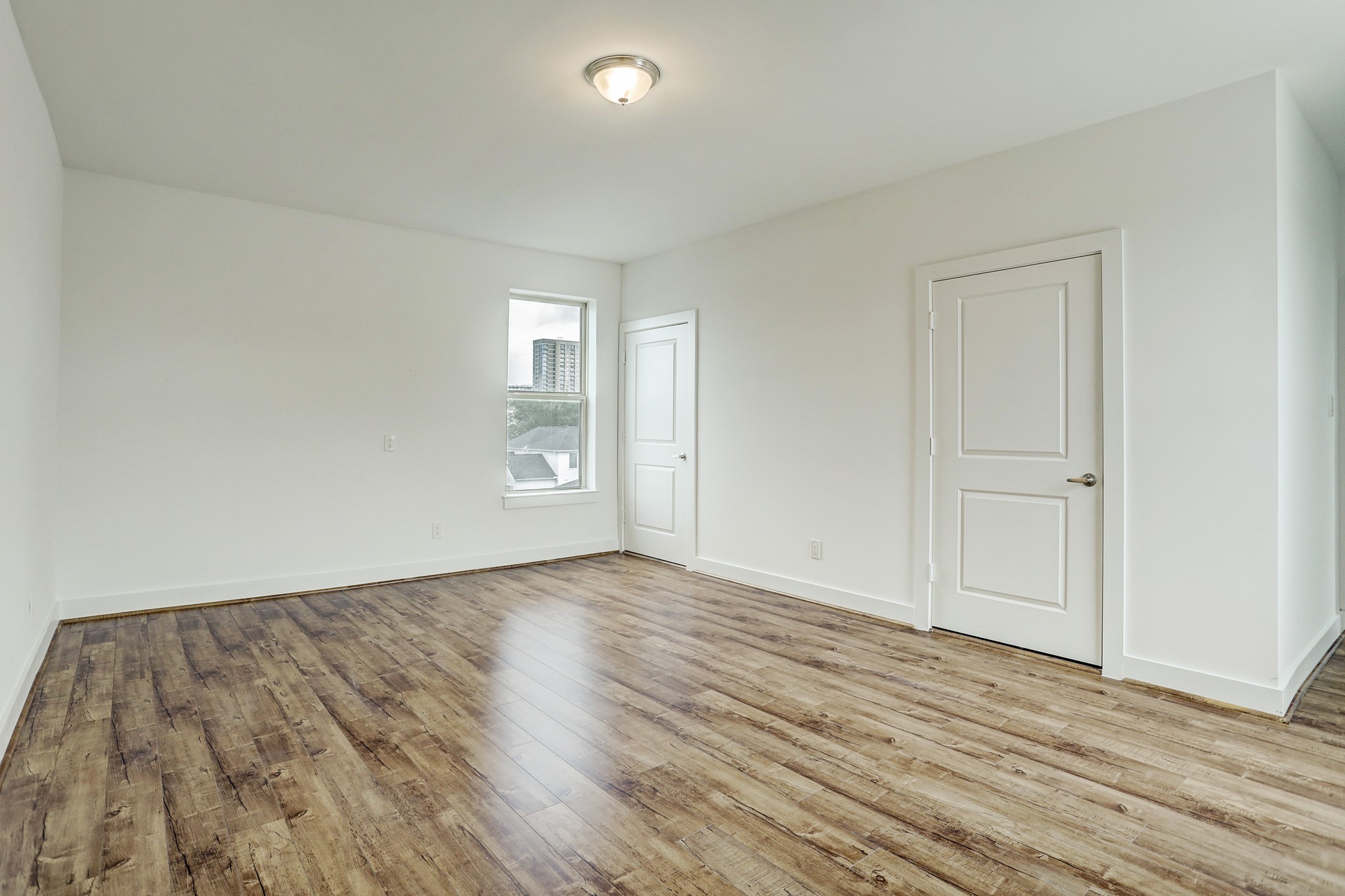 1402 Eberhard Street Houston, TX 77019 - Photo 43 of 50 wooden floor in an empty room