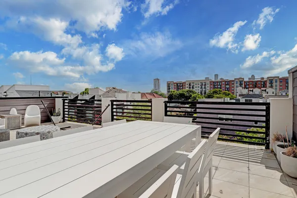a view of a balcony with city view