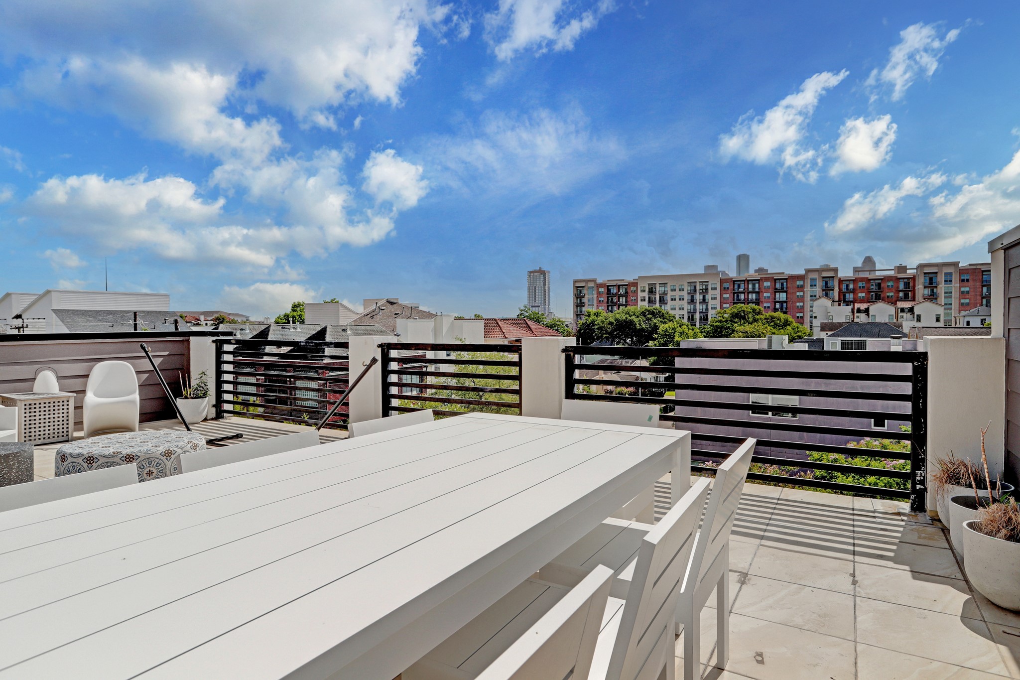 1402 Eberhard Street Houston, TX 77019 - Photo 47 of 50 a view of a balcony with city view