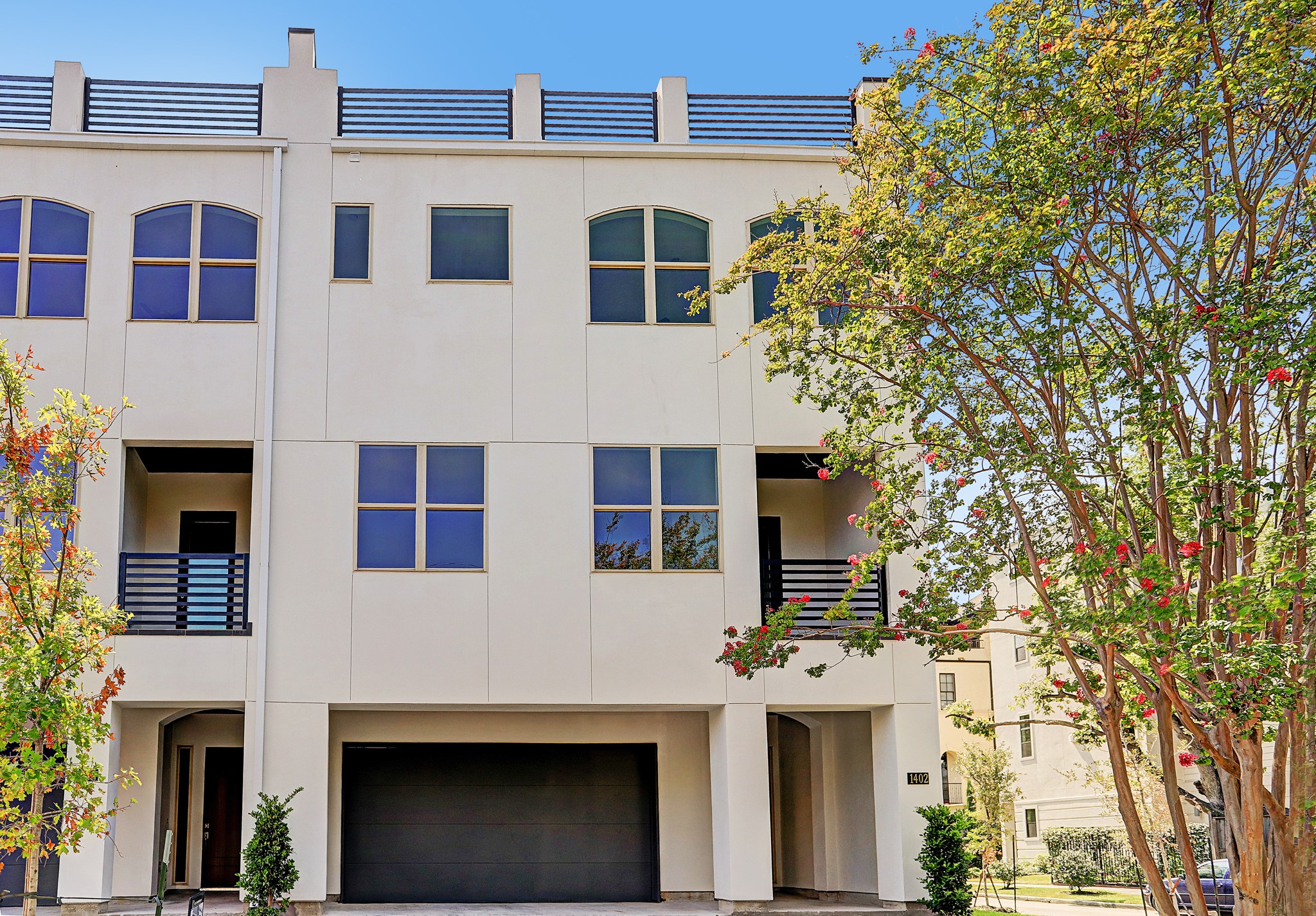 1402 Eberhard Street Houston, TX 77019 - Photo 5 of 50 a front view of a house with a yard