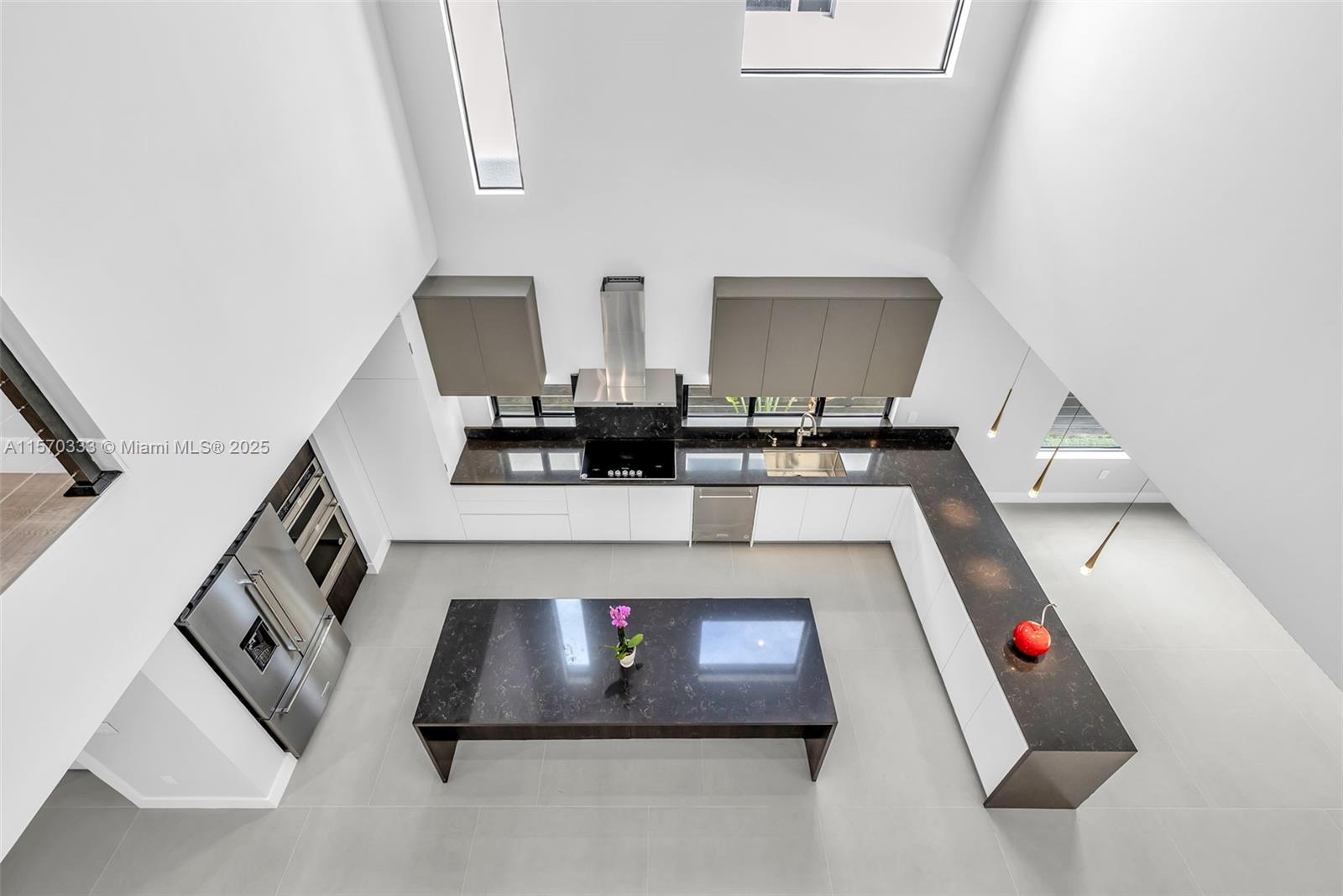 808 Southwest 9th Street, Unit 808A Fort Lauderdale, FL 33315 - Photo 1 of 30 a living room with furniture and a table