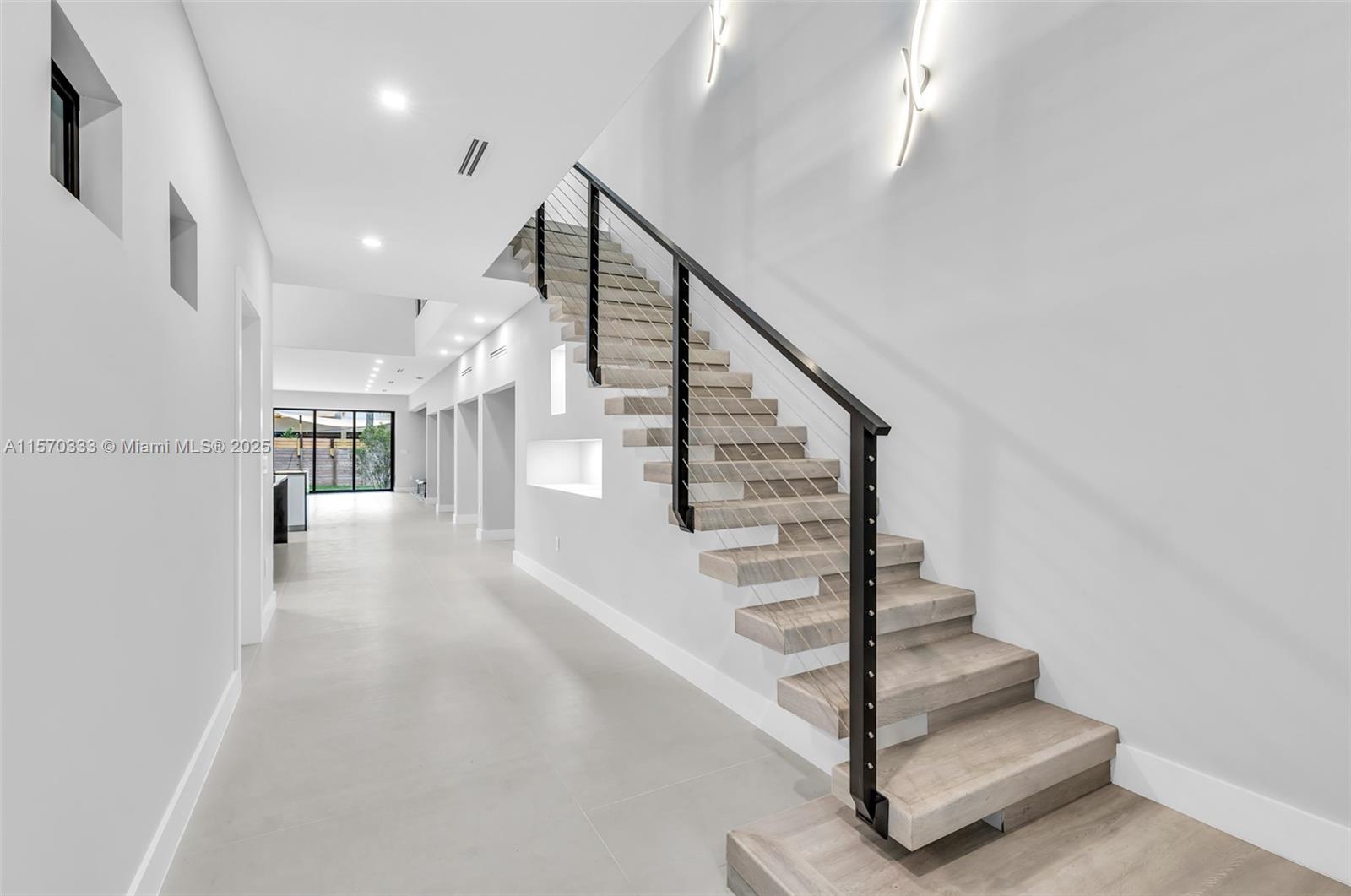 808 Southwest 9th Street, Unit 808A Fort Lauderdale, FL 33315 - Photo 18 of 30 a view of entryway and hall with wooden floor