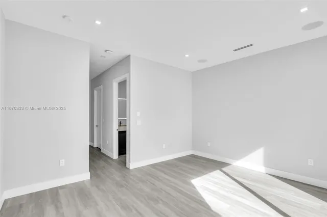 a view of an empty walk in closet