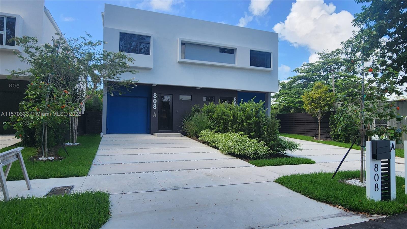 808 Southwest 9th Street, Unit 808A Fort Lauderdale, FL 33315 - Photo 30 of 30 a house with garden in front of it