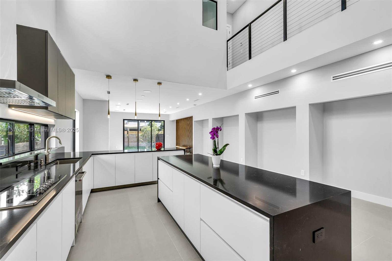 808 Southwest 9th Street, Unit 808A Fort Lauderdale, FL 33315 - Photo 4 of 30 a kitchen with counter top space and stainless steel appliances