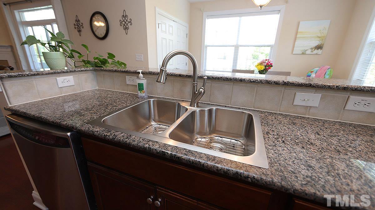 10411 Rosegate Court, Unit 202 Raleigh, NC 27617 - Photo 14 of 35 a close view of sink and tap