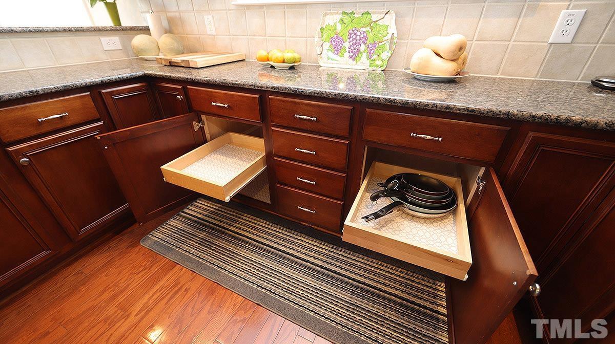10411 Rosegate Court, Unit 202 Raleigh, NC 27617 - Photo 16 of 35 a close view of sink and cabinets