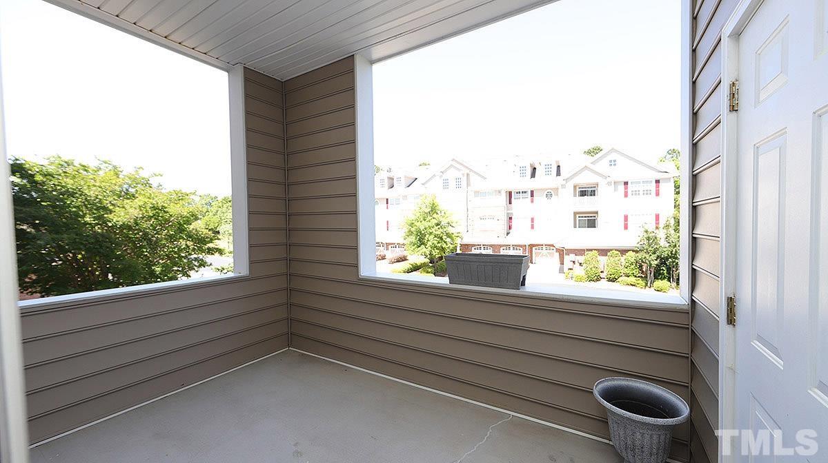 10411 Rosegate Court, Unit 202 Raleigh, NC 27617 - Photo 27 of 35 a view of a balcony and window
