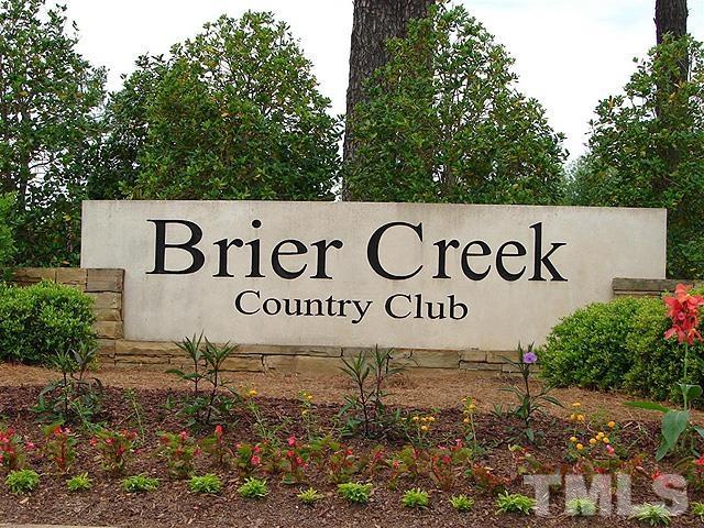 10411 Rosegate Court, Unit 202 Raleigh, NC 27617 - Photo 33 of 35 a sign that is on a brick wall