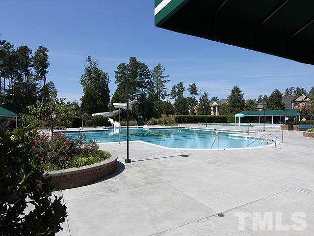 10411 Rosegate Court, Unit 202 Raleigh, NC 27617 - Photo 34 of 35 a view of a swimming pool with a lake view