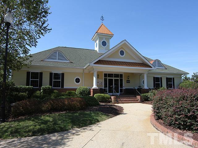 10411 Rosegate Court, Unit 202 Raleigh, NC 27617 - Photo 35 of 35 a front view of a house with garden and porch