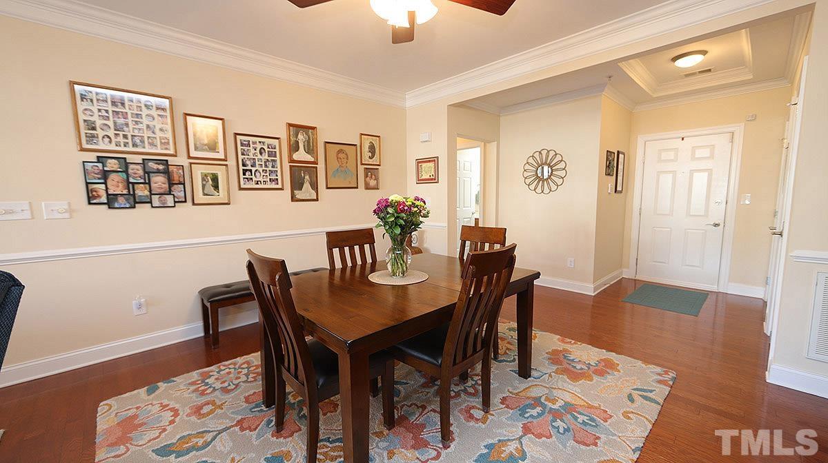 10411 Rosegate Court, Unit 202 Raleigh, NC 27617 - Photo 7 of 35 a view of a dining room with furniture