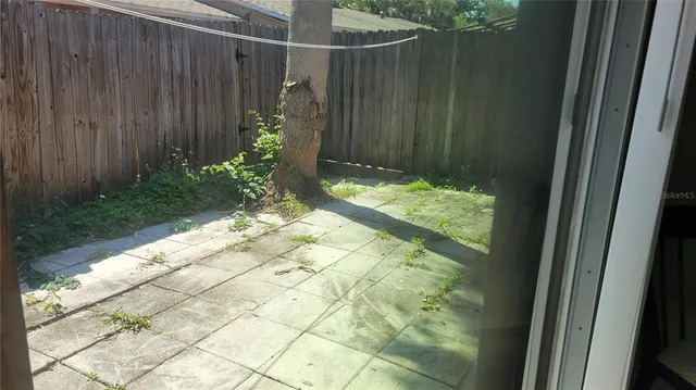 a view of yard with pathway