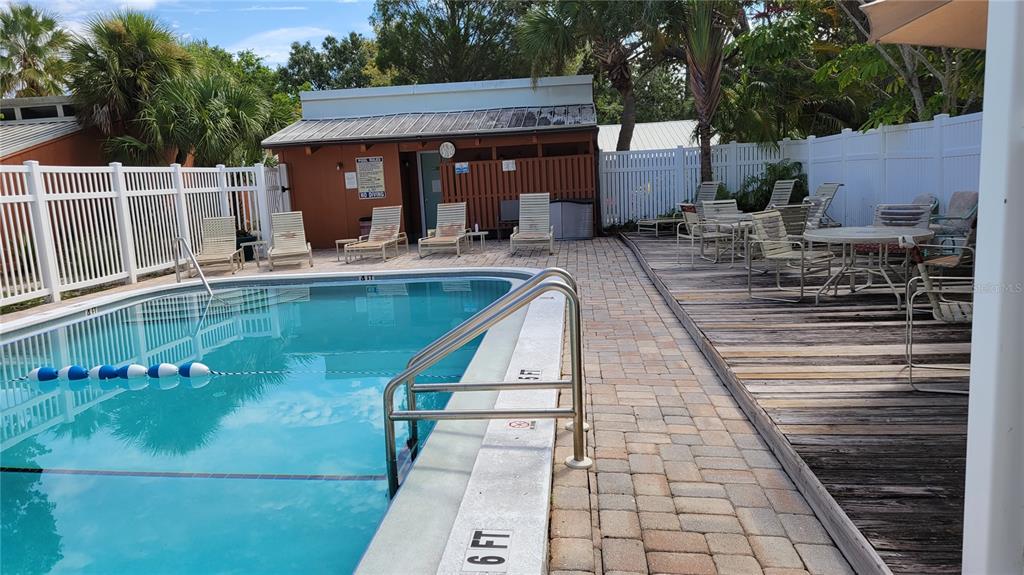 500 North Jefferson Avenue, Unit E5 Sarasota, FL 34237 - Photo 21 of 22 a view of a swimming pool with sitting area