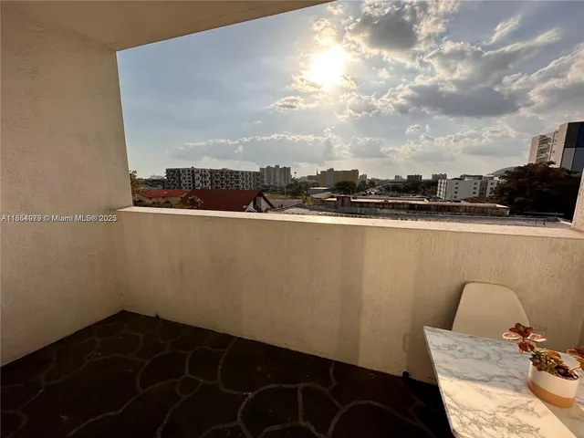 a bathroom with a sink vanity and a mirror