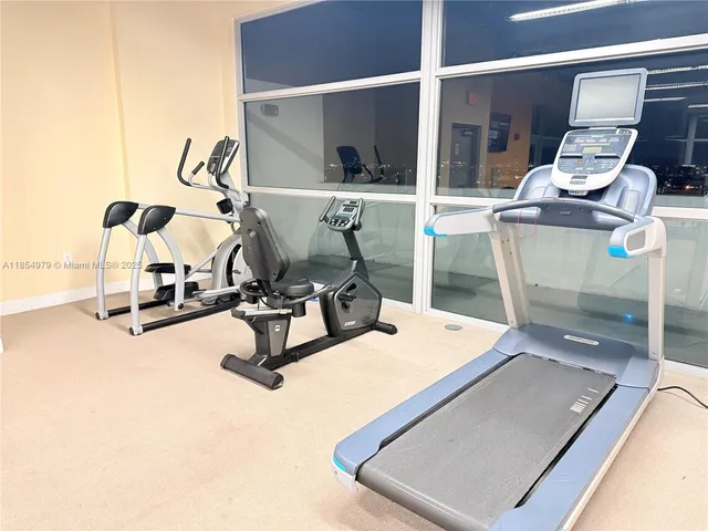 a view of a room with gym equipment