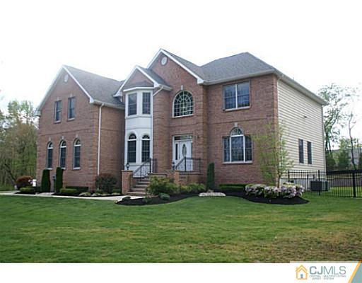 16 Westley Road Old Bridge, NJ 08857 - Photo 1 of 25 a front view of a house with a yard