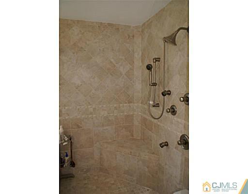 16 Westley Road Old Bridge, NJ 08857 - Photo 12 of 25 a bathroom with a shower