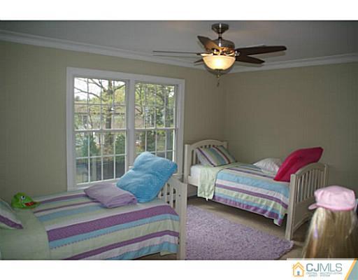 16 Westley Road Old Bridge, NJ 08857 - Photo 14 of 25 a living room with furniture and a large window