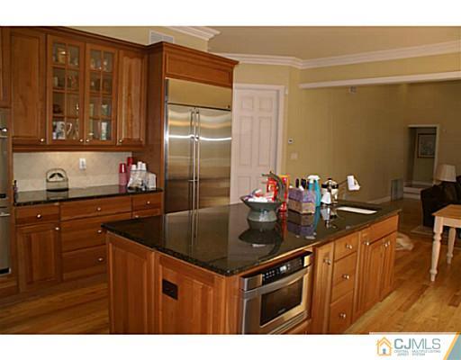 16 Westley Road Old Bridge, NJ 08857 - Photo 5 of 25 a kitchen that has a sink and cabinets