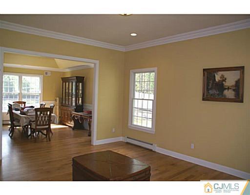 16 Westley Road Old Bridge, NJ 08857 - Photo 7 of 25 a living room with furniture and a window