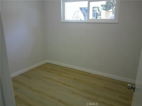 a view of a window in an empty room