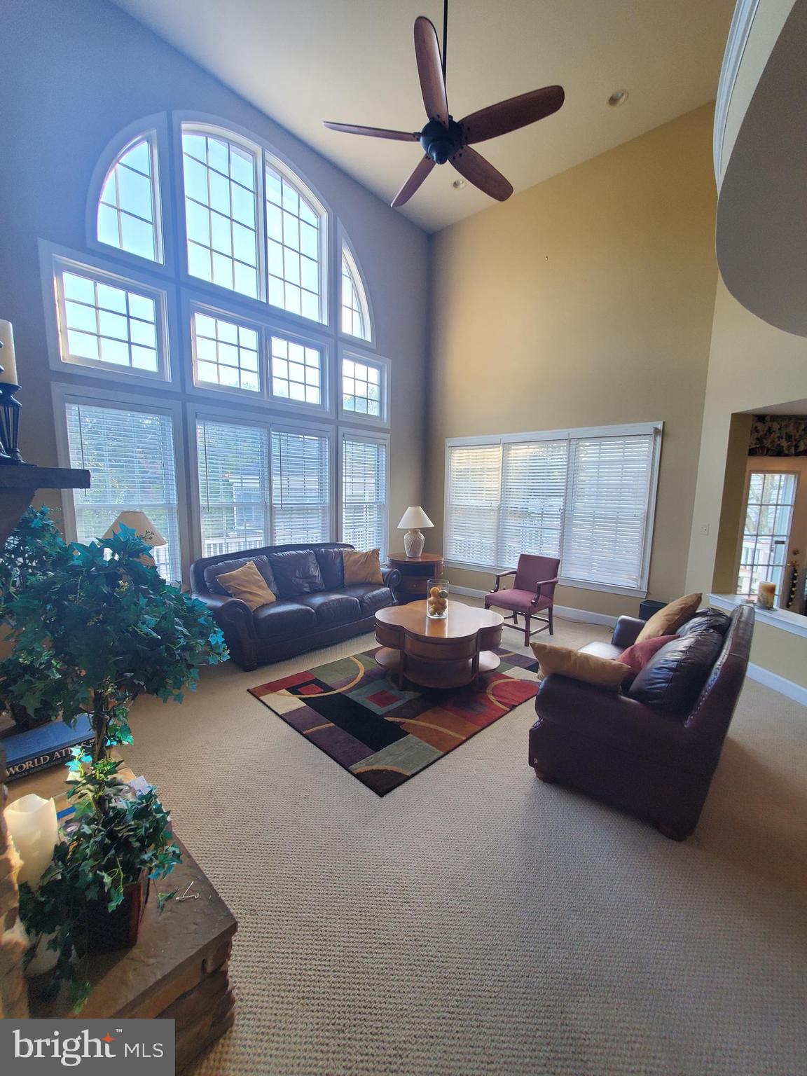 14418 Ashleigh Greene Road Boyds, MD 20841 - Photo 11 of 31 a living room with furniture and a large window