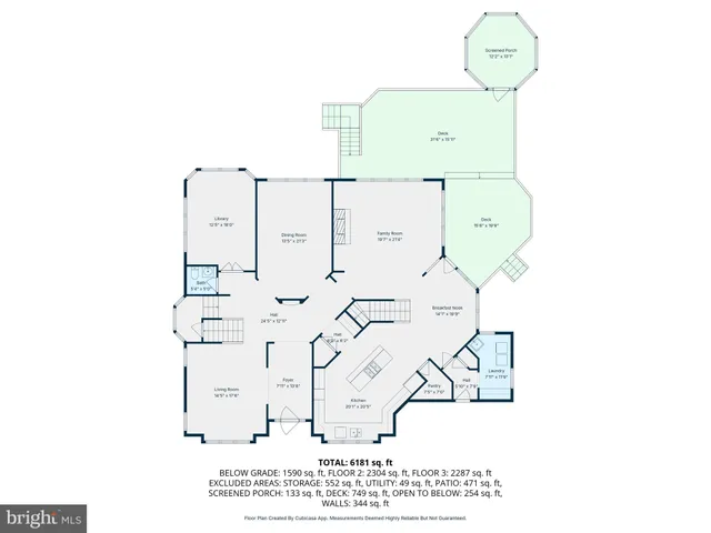 a view of a house with a backyard and sitting area