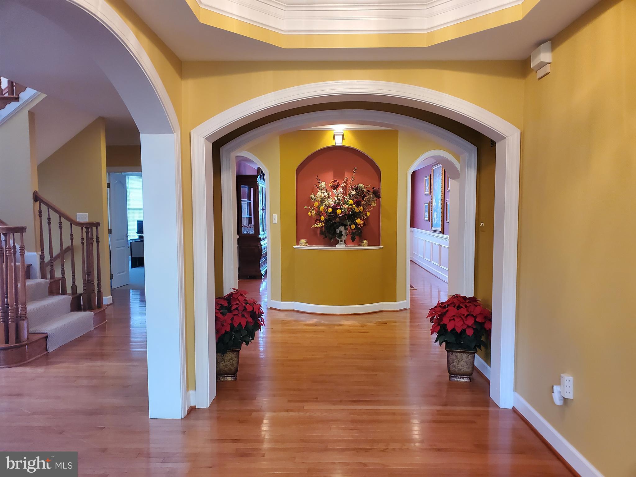 14418 Ashleigh Greene Road Boyds, MD 20841 - Photo 3 of 31 a view of front door with wooden floor