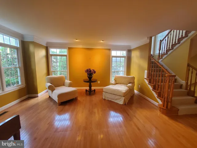 a view of front door with wooden floor