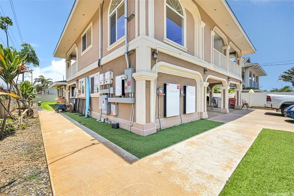 a view of a building with a yard