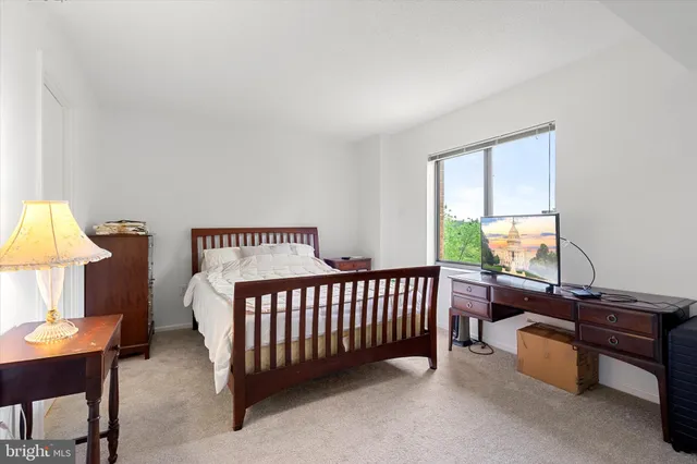 a bathroom with 2 sink and a mirror
