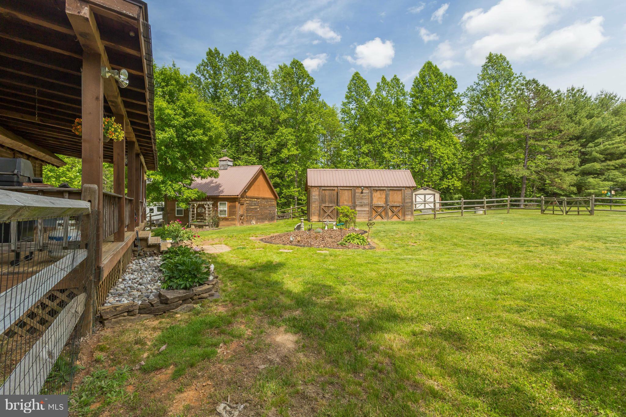2277 Beaver Dam Road Midland, VA 22728 - Photo 22 of 30 Exterior (Rear) Overlooking Garage and Sheds