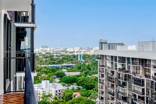 a view of a building from a balcony