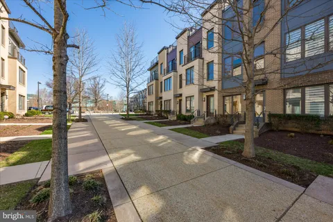 a view of a building with a yard