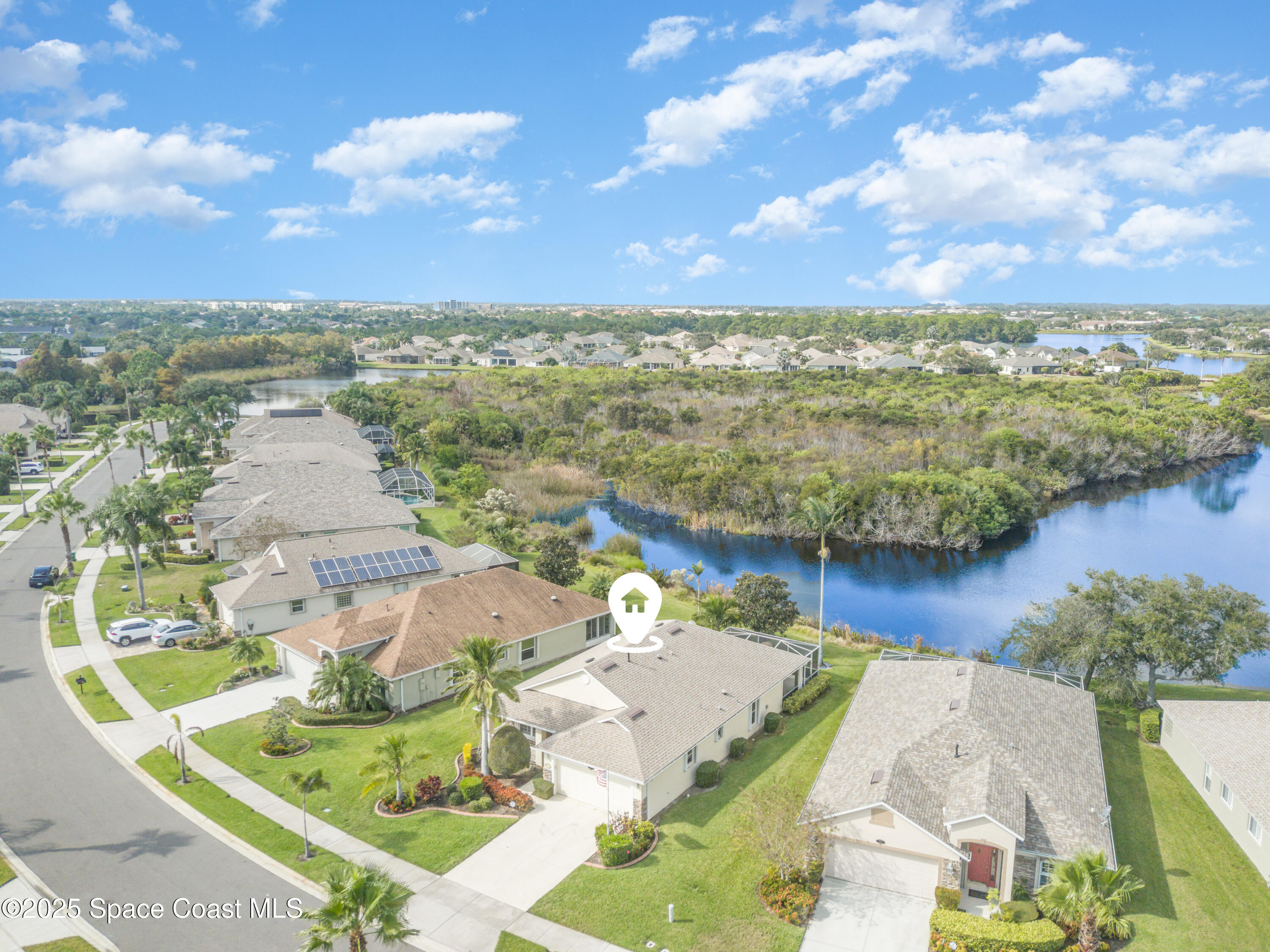1664 Boca Rio Drive Melbourne, FL 32940 - Photo 6 of 46 an aerial view of ocean and residential houses with outdoor space