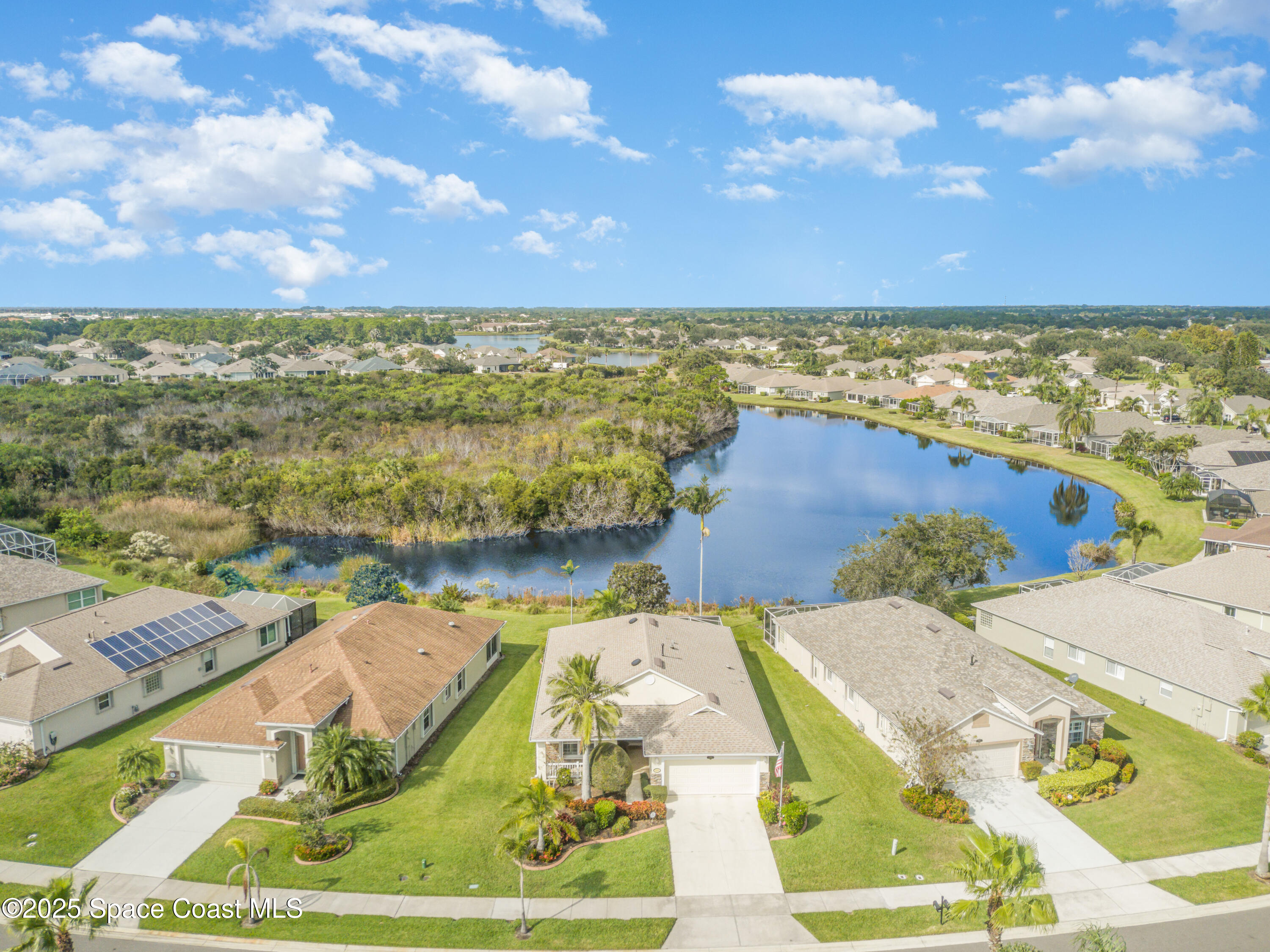 1664 Boca Rio Drive Melbourne, FL 32940 - Photo 7 of 46 a view of lake view