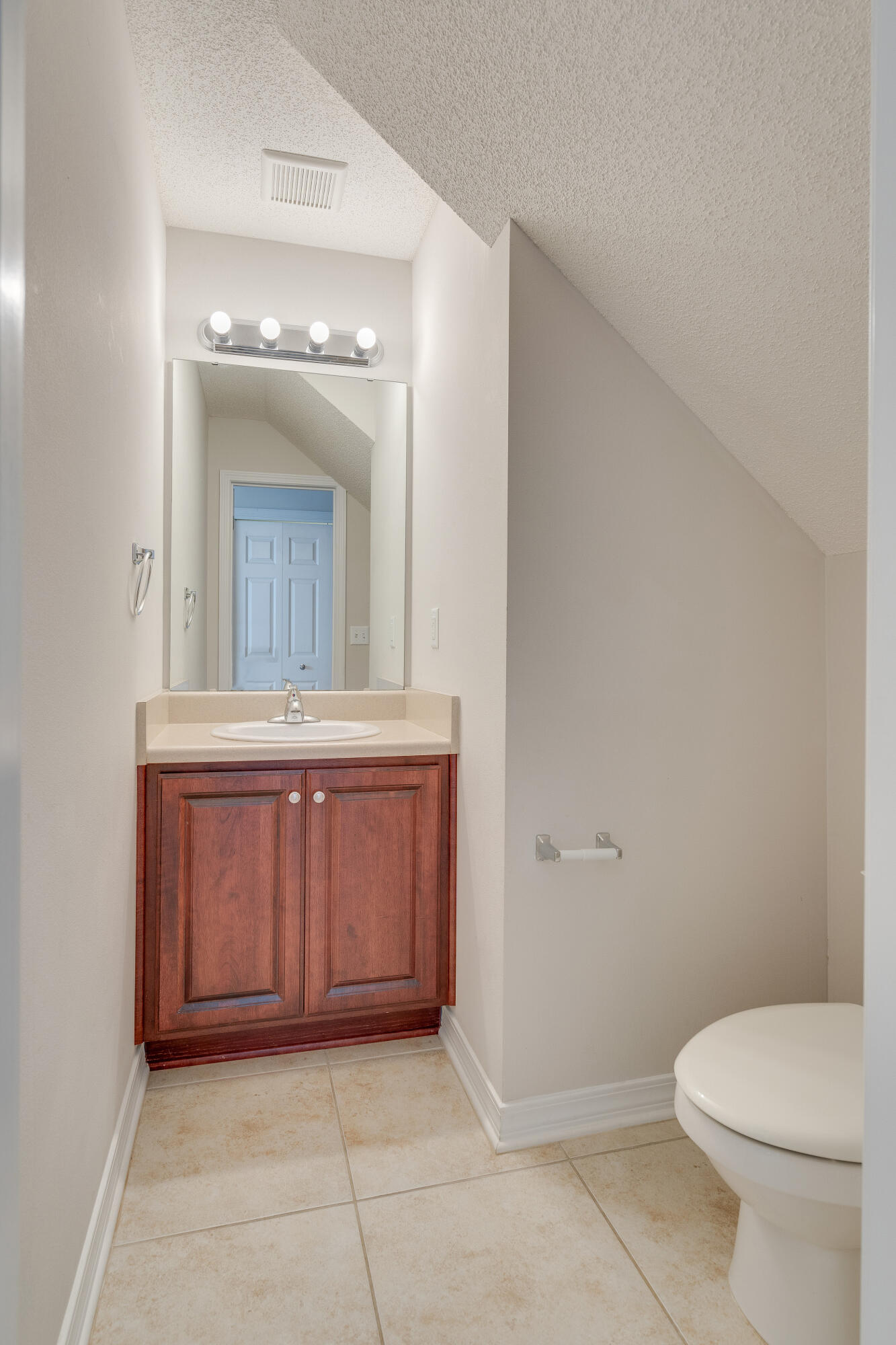 315 Dahlquist Drive Crestview, FL 32539 - Photo 15 of 32 a bathroom with a granite countertop sink mirror and toilet