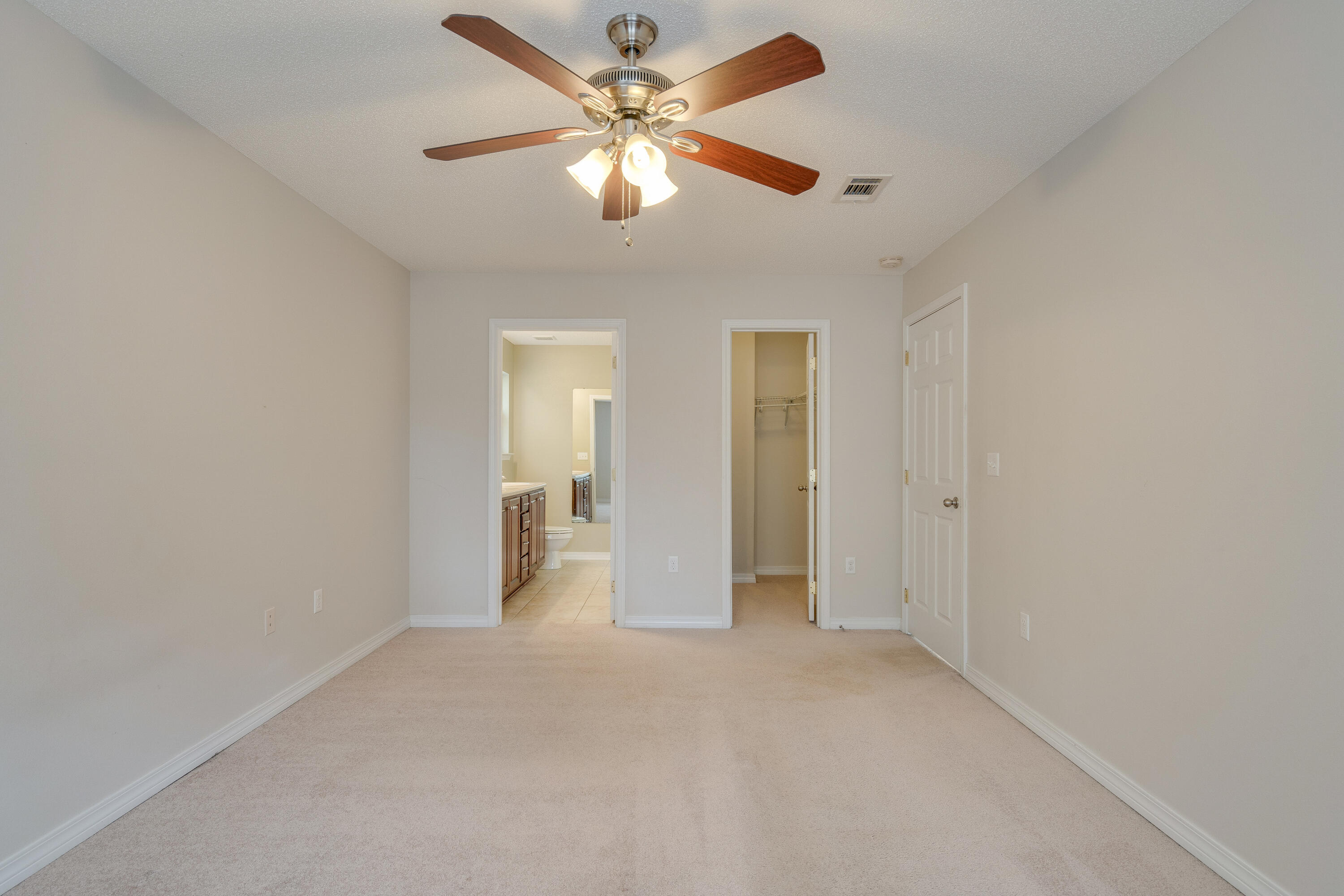 315 Dahlquist Drive Crestview, FL 32539 - Photo 18 of 32 a view of a room with a ceiling fan and a chandelier fan