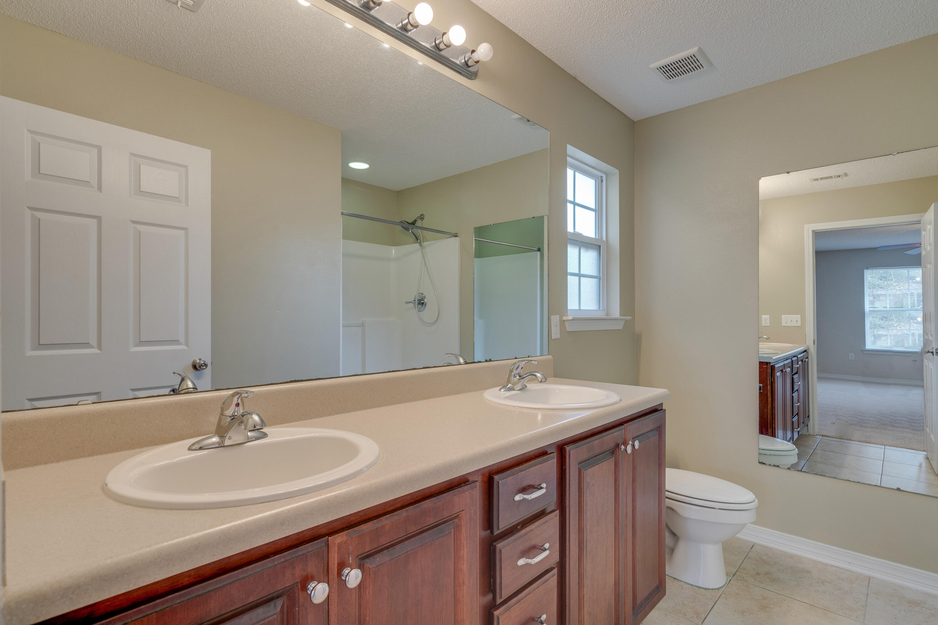 315 Dahlquist Drive Crestview, FL 32539 - Photo 20 of 32 a bathroom with a sink and a toilet