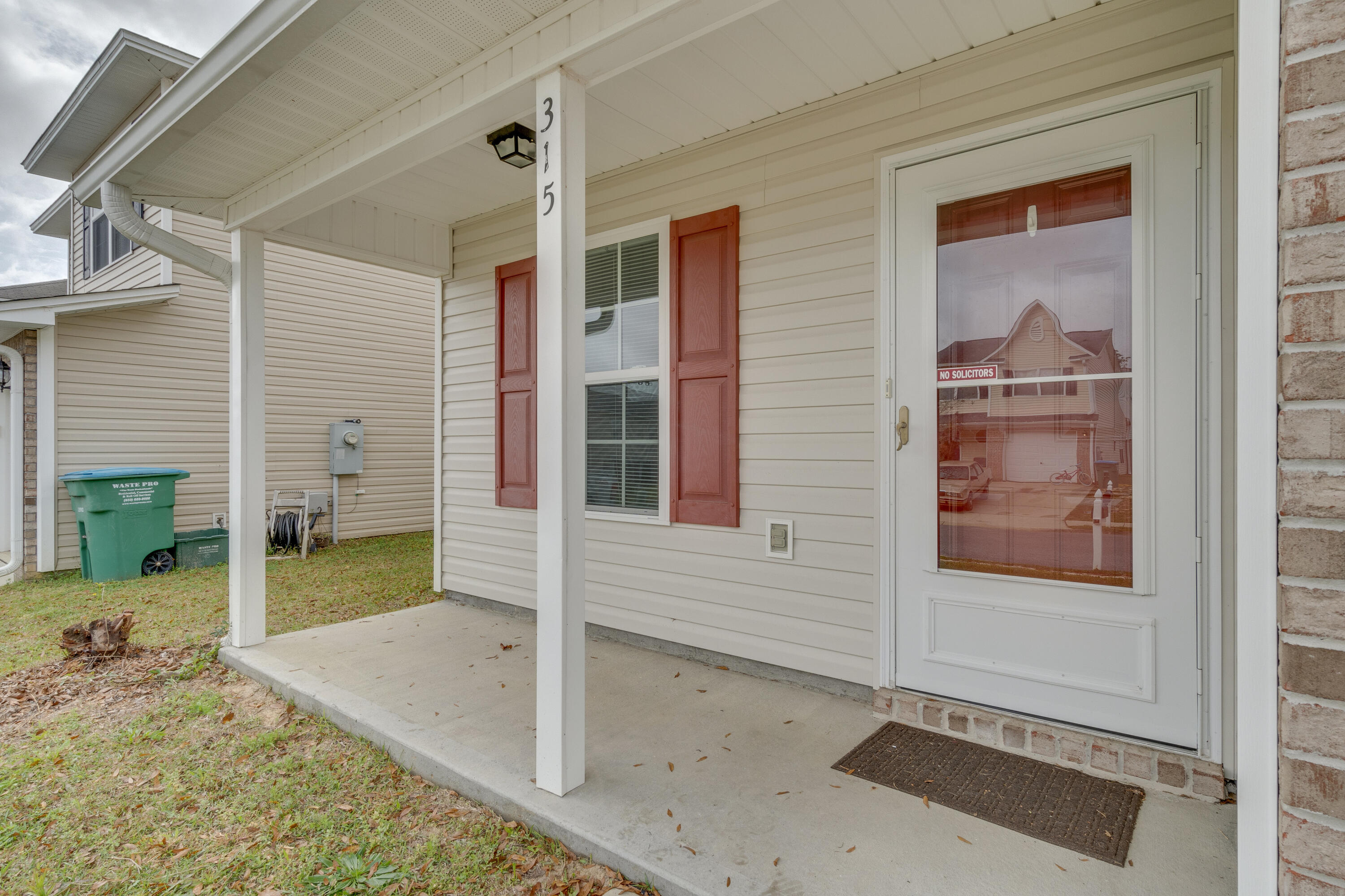 315 Dahlquist Drive Crestview, FL 32539 - Photo 4 of 32 a front view of a house with a porch