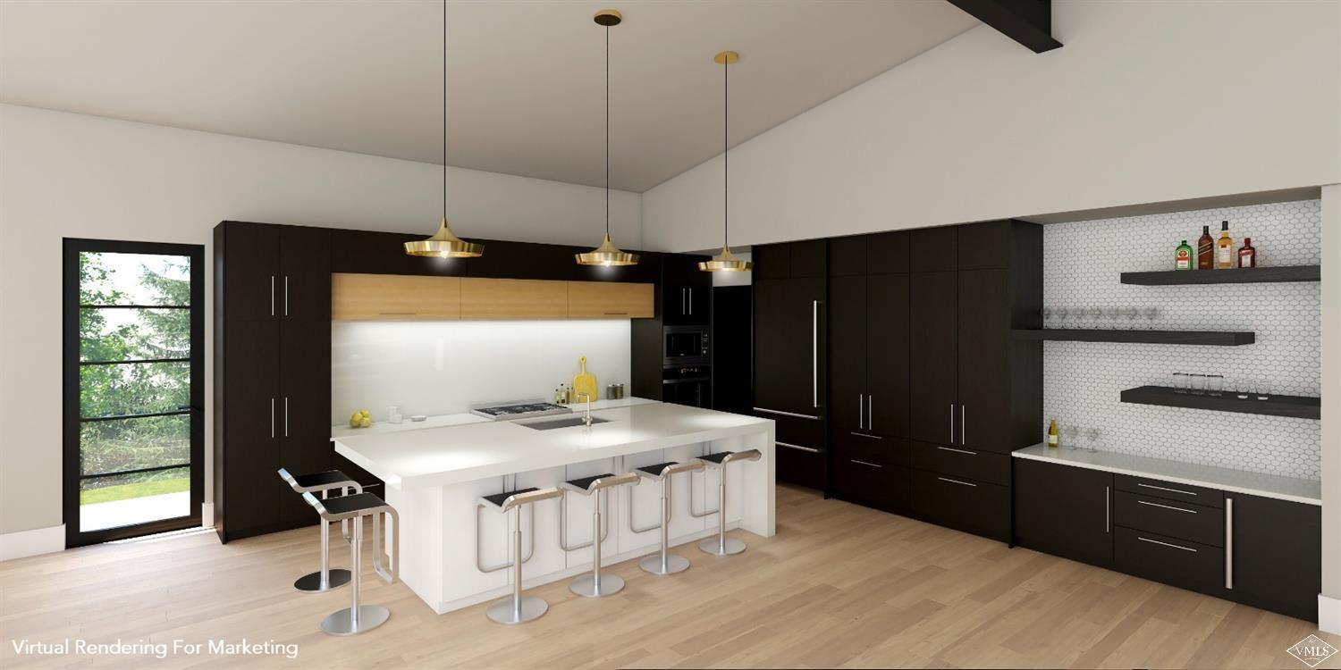 4296 Nugget Lane Vail, CO 81657 - Photo 3 of 7 a kitchen that has a cabinets and a stove