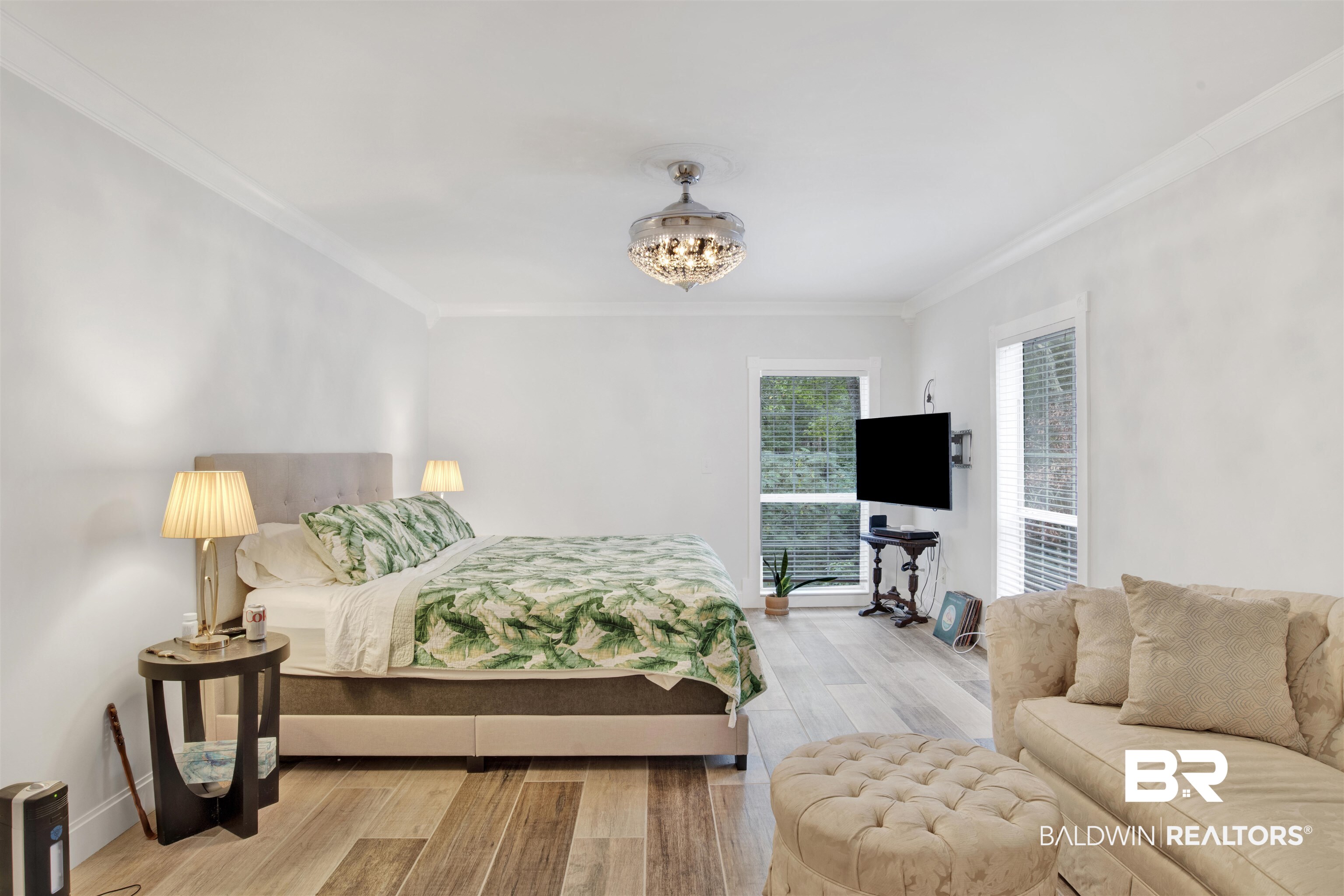 7641 Hitt Road Mobile, AL 36695 - Photo 16 of 29 Bedroom with light wood-type flooring, crown molding, and a chandelier