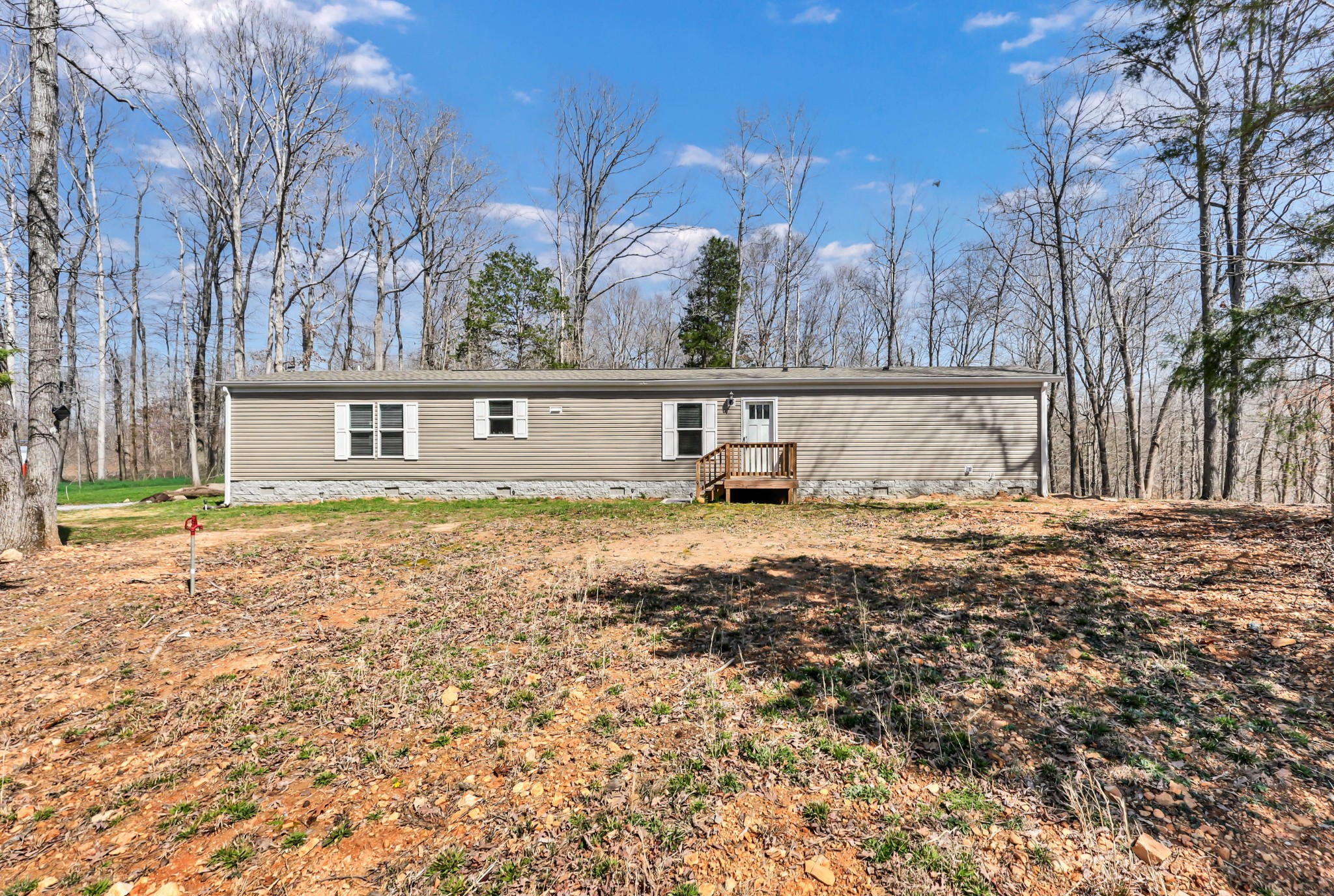 4819 Tarsus Road Palmyra, TN 37142 - Photo 2 of 15 a view of a house with a yard
