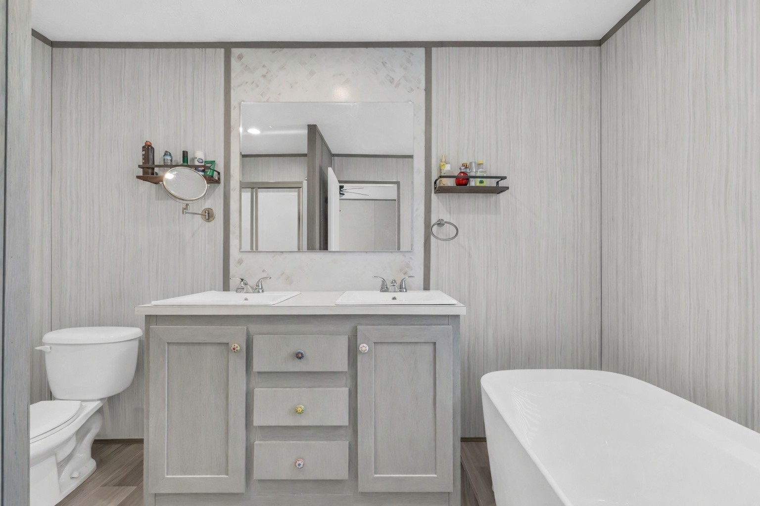 4819 Tarsus Road Palmyra, TN 37142 - Photo 9 of 15 a bathroom with a sink a toilet and mirror